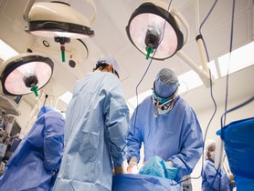 photo of surgeons operating