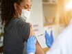 photo of person getting vaccinated