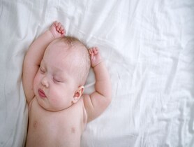 photo of infant baby sleeping