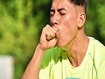 photo of an athlete coughing