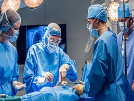 Doctors/surgeons team performing surgery 