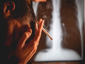 photo of Smokers in front of the x ray image