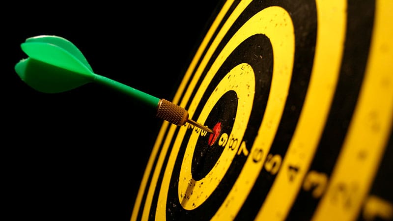 photo of dart hitting target on board