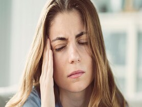 photo of Young woman with headache