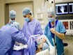 photo of Doctor and nurses performing operation