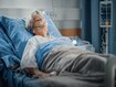 photo of Elderly Woman Wearing Oxygen Mask Sleepin