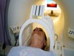 photo of Inside tube of MRI scanner women receivin