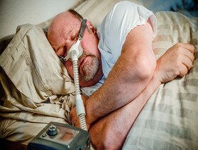 photo of man with CPAP Machine