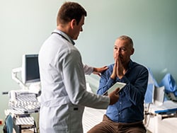 photo of a doctor and patient