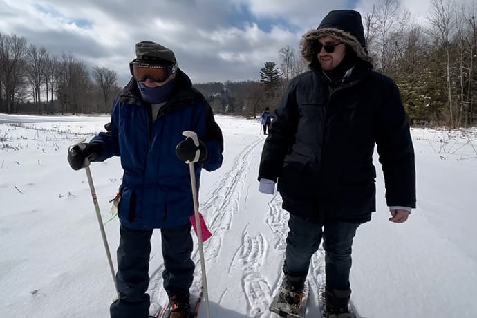 photo of Dr Tucker snowshoeing at age 99