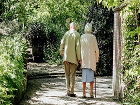 photo of Old aged couple walking 