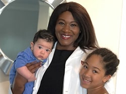 photo of Oganna Nnamami Silva MD with her two children.