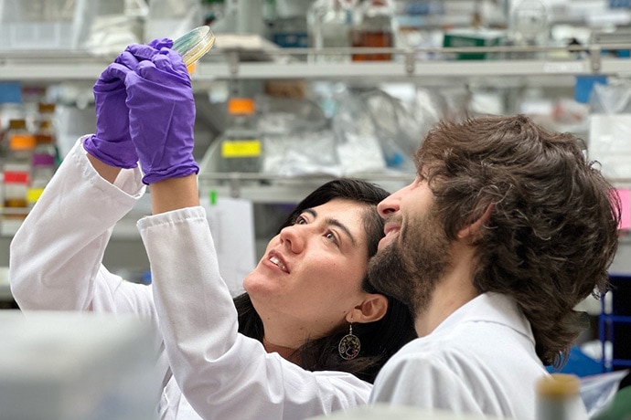 photo of Susana Vazquez Torres examines bacteria