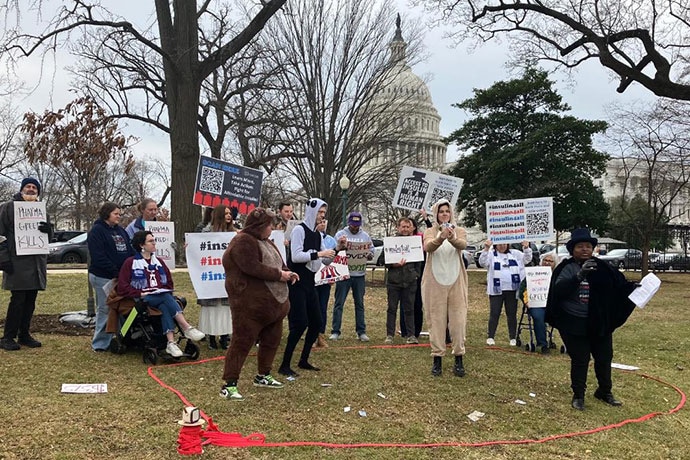 photo of Intenational staged a three-act play outside the US Capitol