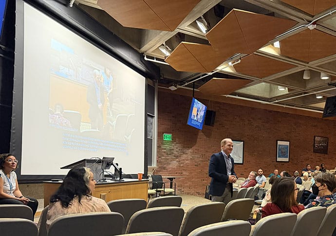 photo of Dr Nathan Gray speaking at the Graphic Medicine 2026 Conference