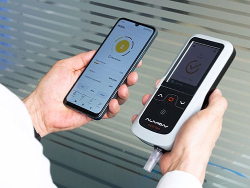 photo of The acetone analyzer connects to a smartphone app to monitor metabolic status.