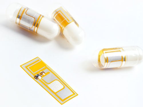 photo of A gelatin capsule with a tiny sensor inside