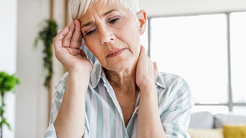 photo of Senior woman not feeling good